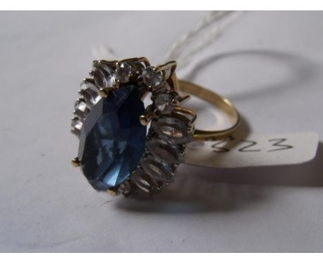 A large blue & white stone dress ring  in gold mount approx size P      