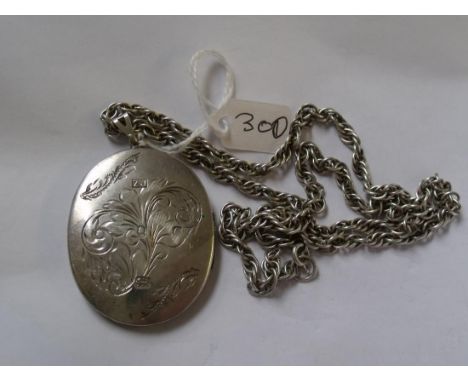 A large silver locket 5cm long on thick  silver rope twist chain 44g      