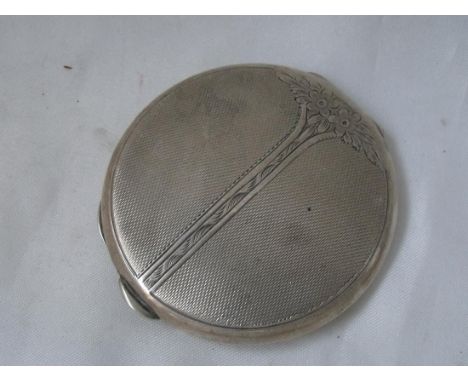 Circular engine-turned compact. 3in wide     
