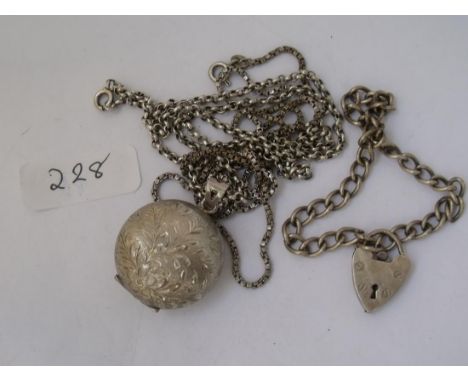 Silver locket on silver chain etc     