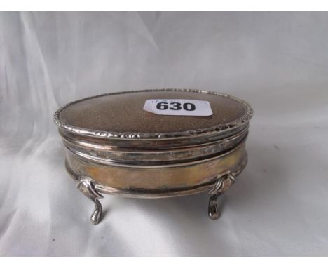 Ring box with oval outline and hinge cover on four supports.  4in wide. Sheffield 1914        