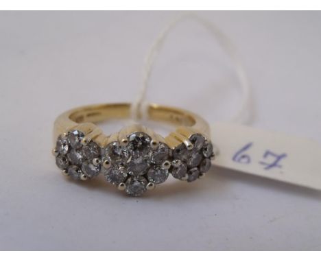 GOOD HEAVY 18CT GOLD & DIAMOND   triple cluster ring set with 1.50 carats, as marked   in shank (size Q)        