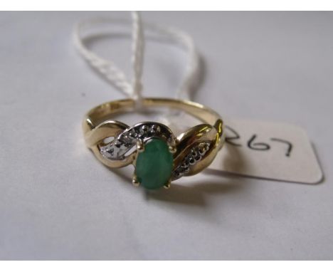 Gold mounted emerald and diamond ring  approx size N        