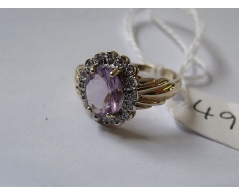 9ct purple stone dress ring size L     