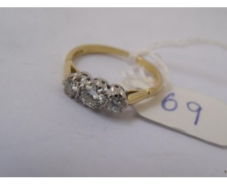 18ct 3 stone ring set with approximately 0.60 points   of diamonds (size O)        