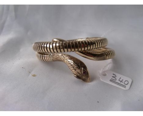 9ct COILED FLEXI SNAKE BANGLE  with gem set eyes       