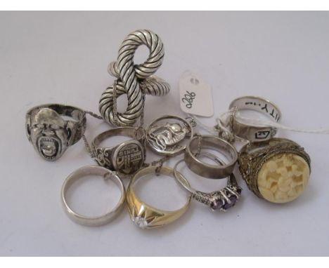 Group of silver rings on silver chain 54g    