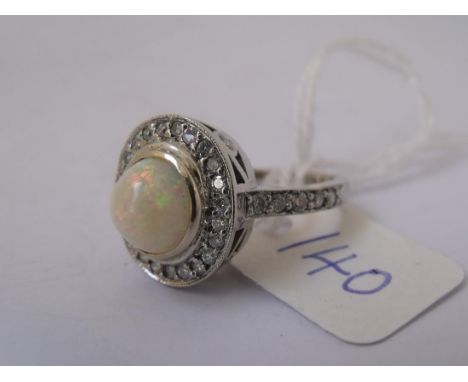 14ct gold fancy opal & diamond cluster ring   with diamond setting and bezel      