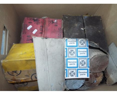 Four vintage boxes of pistons to include BHB, British Leyland and AE, all boxed.