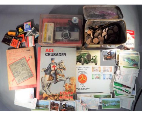 A mixed lot to include stamps, coins, matchbooks, cigarette cards and a boxed Kodak 255X Instamatic camera.