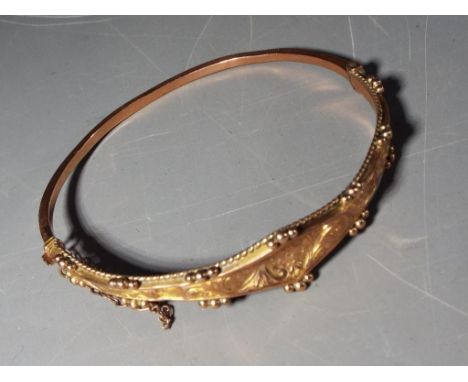 A lady's antique hallmarked 9 carat gold bangle, Birmingham assay 1907, approx 5.46 gmCondition - some denting and bending, c
