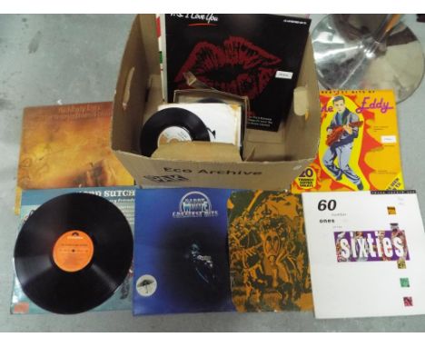 A quantity of 33 and 45 RPM vinyl records to include Eric Clapton, The Who, The Rolling Stones, The Moody Blues and similar.