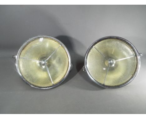 Lucas - A pair of vintage Lucas P100L chrome plated headlamps, approximately 31 cm (d). [2]