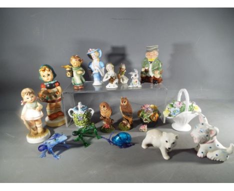 A mixed lot of ceramics and glassware to include two Hummel figurines by Goebel, glass animals, Royal Doulton birds and simil