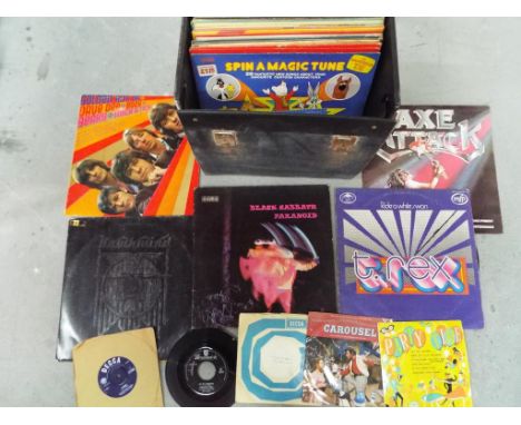 A carry case containing a small quantity of vinyl records to include T-Rex, Black Sabbath, Hawkwind, Rolling Stones and simil