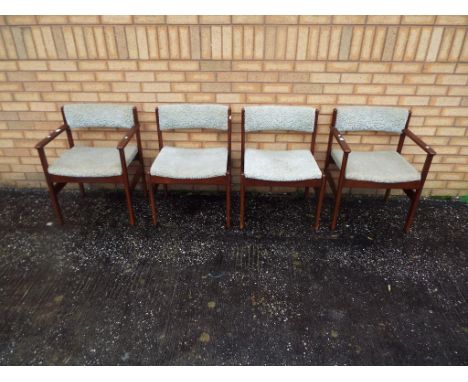 Four vintage dining chairs with upholstered seats and backrest. [4]