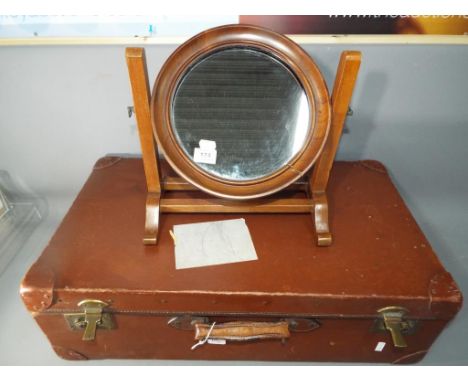 A wooden framed swivel vanity mirror approximate height 135 cm x 34 cm x 20 cm and a vintage travel case approximate height 4