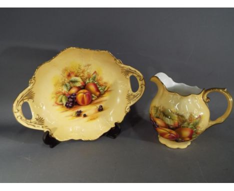Aynsley Orchard Gold ceramic jug approximately 13 cm height and oval dish measuring approximately 26 cm x 20 cm [2]