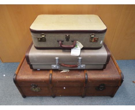 A vintage shipping trunk measuring approximately 36 cm x 100 cm x 57 cm and two suitcases. [3]