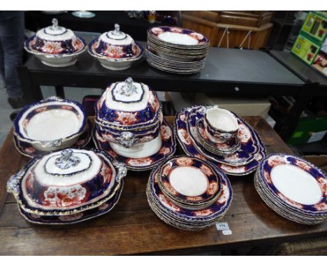 Booths - in excess of 55 pieces of ceramic tableware by Booths decorated in the Victoria pattern to include tureens, serving 