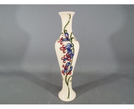 Moorcroft Pottery large ceramic vase decorated in Bluebell Harmony pattern with maker's mark to the base and measuring approx