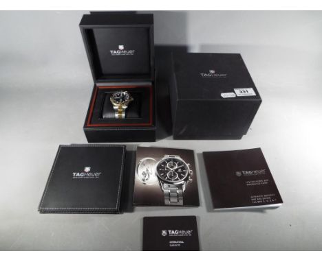 A gentleman’s Tag Heuer Aquaracer Calibre 5, 500 m, 25 jewel automatic wristwatch, WAK2122.BB0835. black dial with baton mark