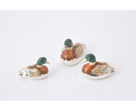 A graduated set of three silver and enamel model ducks by J A H, London 2006, mallard drakes, 5cm (2 1/2in) long and smaller 