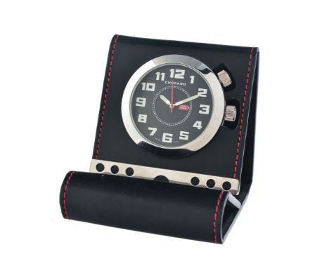 Chopard, Miglia, Ref. 51/8955/02, Stainless steel and leather travel alarm clock, no. 1254699   Movement: Quartz alarm   Case
