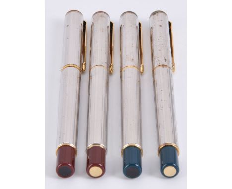 Parker, 88, two silver plated fountain pens and ball point pens, the fountain pen caps with gilt arrow clip, medium nibs, aer