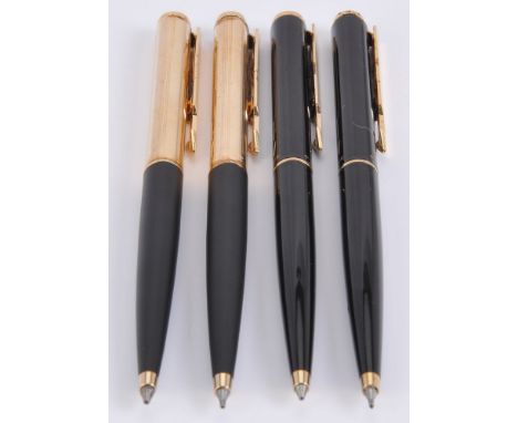 Parker, Arrow, a matt black and gilt ball point pen and propelling pencil, with arrow clips; Parker, Arrow, a black laque bal