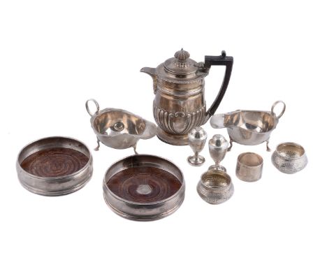 A collection of silver, comprising: a late Victorian half gadrooned hot water pot by Charles Stuart Harris, London 1900; a pa