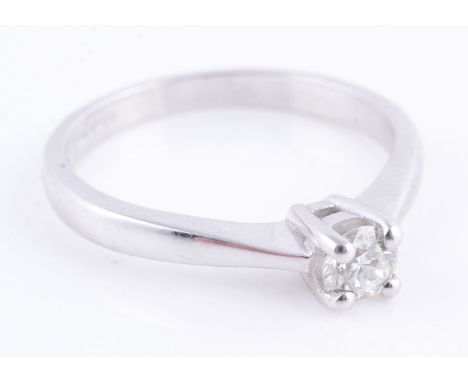 A diamond single stone ring, the brilliant-cut diamond approximately 0.20 carats, finger size N 1/2, hallmarked 18ct gold, 3g