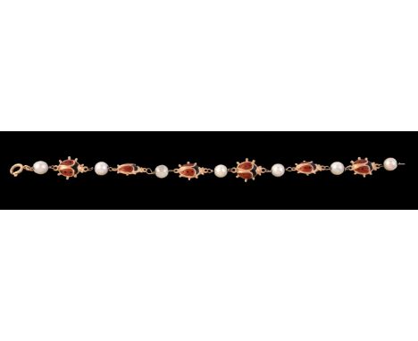 A cultured pearl and enamel ladybird bracelet, composed of alternating enamel ladybirds and cultured pearls, stamped 750, 18.