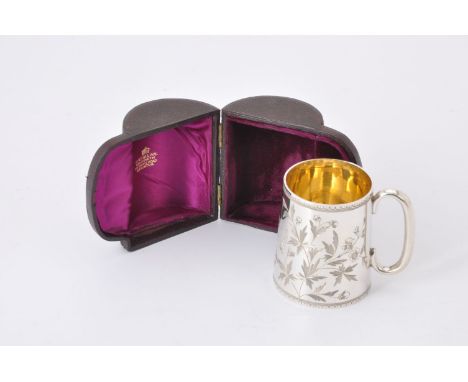 A Victorian silver christening mug by Holland, Son &amp; Slater, London 1881, tapered cylindrical and engraved with blossom s