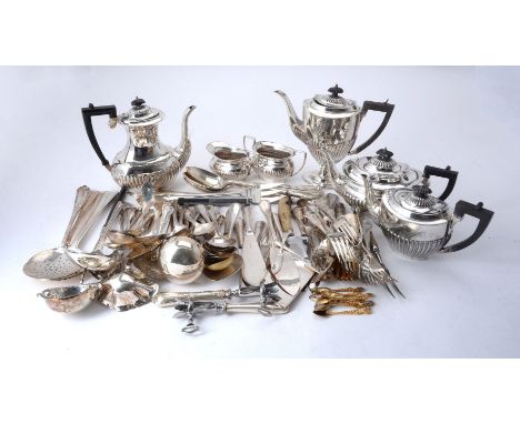 A quantity of electro-plated flatware and serving pieces, some in steel, including: a ham bone holder; a silver punch ladle w