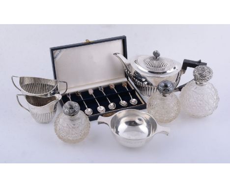 A collection of small silver, comprising: a late Victorian oval half reeded three piece tea service by John Round &amp; Son L