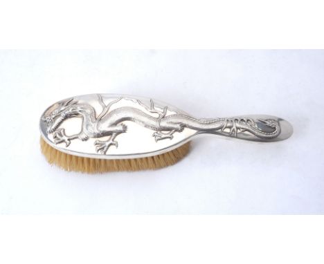 A Chinese export silver hair brush by Wang Hing &amp; Co., Hong Kong, Canton &amp; Shanghai ('WH90' and a character mark), fl