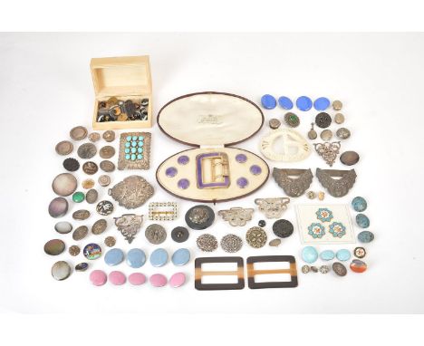 A collection of buttons and buckles, including: a late Victorian silver open work two-part buckle by King &amp; Sons, Chester