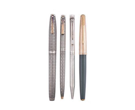 Sheaffer, a silver coloured fountain pen and ball point pen, the fountain pen cap with a clip and stamped sterling silver, th