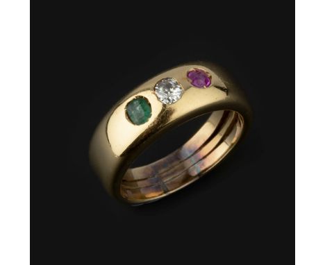 A ruby, diamond and emerald ring, the oval old cut diamond between an oval cut emerald and a circular cut ruby, finger size P