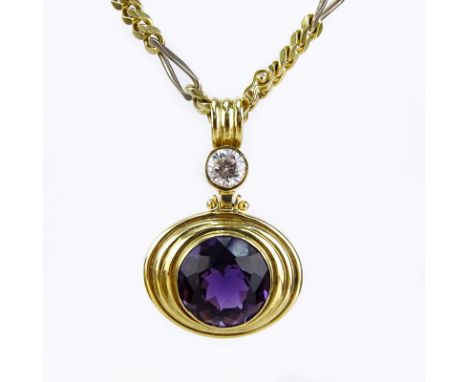 Large Round Cut Amethyst, CZ and 18 Karat Yellow Gold Pendant Necklace. Amethyst measures 18mm, 13mm D. Stamped 18K. Very goo
