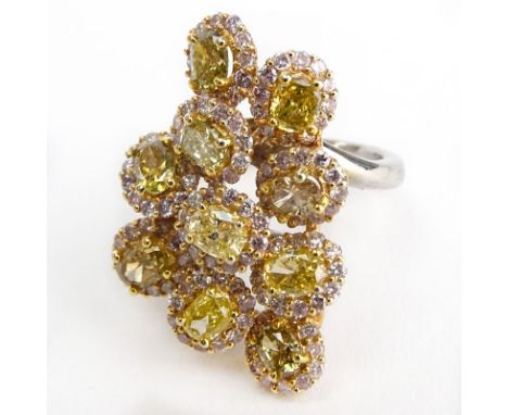Approx. 3.67 Carat TW Multi Color Diamond and 18 Karat Yellow and White Gold Ring. Stamped 18K. Very good condition. Ring siz