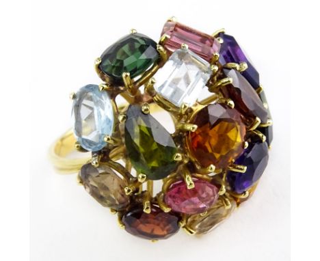 Vintage Multi Gemstone and 18 Karat Yellow Gold Dome Ring. Stamped 750. Good vintage condition. Ring size 6-1/2. Approx. weig