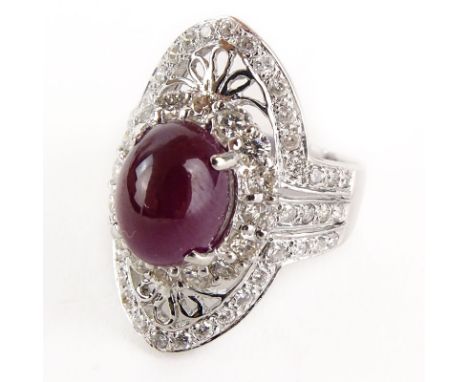 Approx. 4.0 Carat Cabochon Ruby, 2.0 Carat Round Brilliant Cut Diamond and 18 Karat White Gold Ring. Ruby with vivid saturati