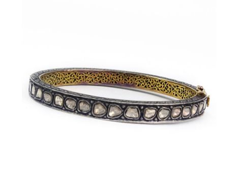 Approx. 7.0 Carat Table Cut Diamond, 18 Karat Yellow Gold and Silver Hinged Bangle Bracelet. Unsigned. Good condition. Measur