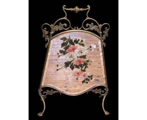 Edwardian brass and floral painted mirror firescreen, 81cm by 56cm.