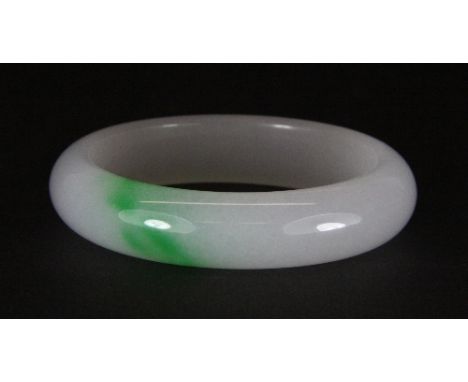 A Chinese polished jade bangle (internal Dia 6cm)