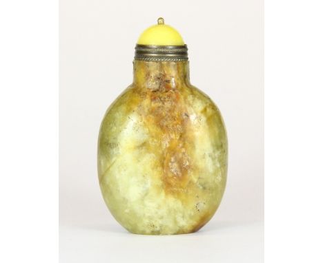 A 19th century Chinese jade / hardstone snuff bottle with gilt and yellow hardstone stopper H 7cm