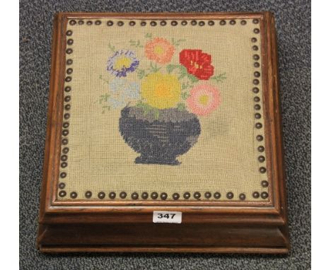 An early 19th century tapestry upholstered foot stool