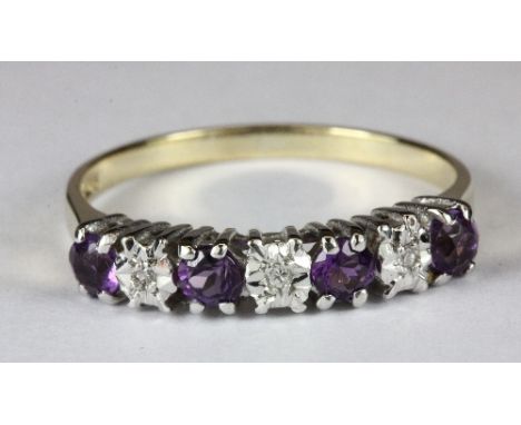 A 9ct gold amethyst and diamond ring (O.5)